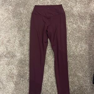 Workout Leggings Cross over waistband 
Size medium 
Stretchy